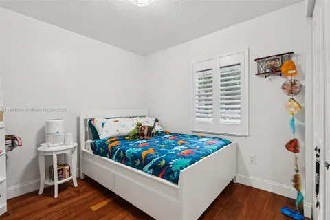 a front view of house with yard and seating area