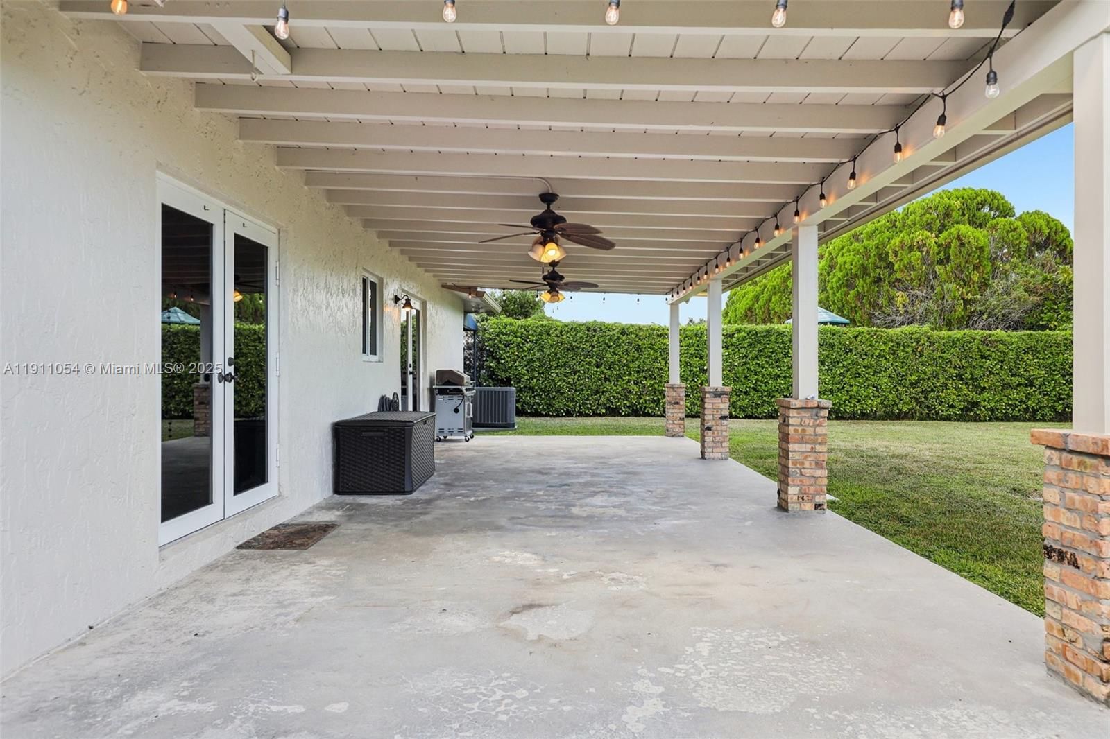 6721 Southwest 135th Avenue Miami, FL 33183 - Photo 43 of 66 a view of a porch and garden