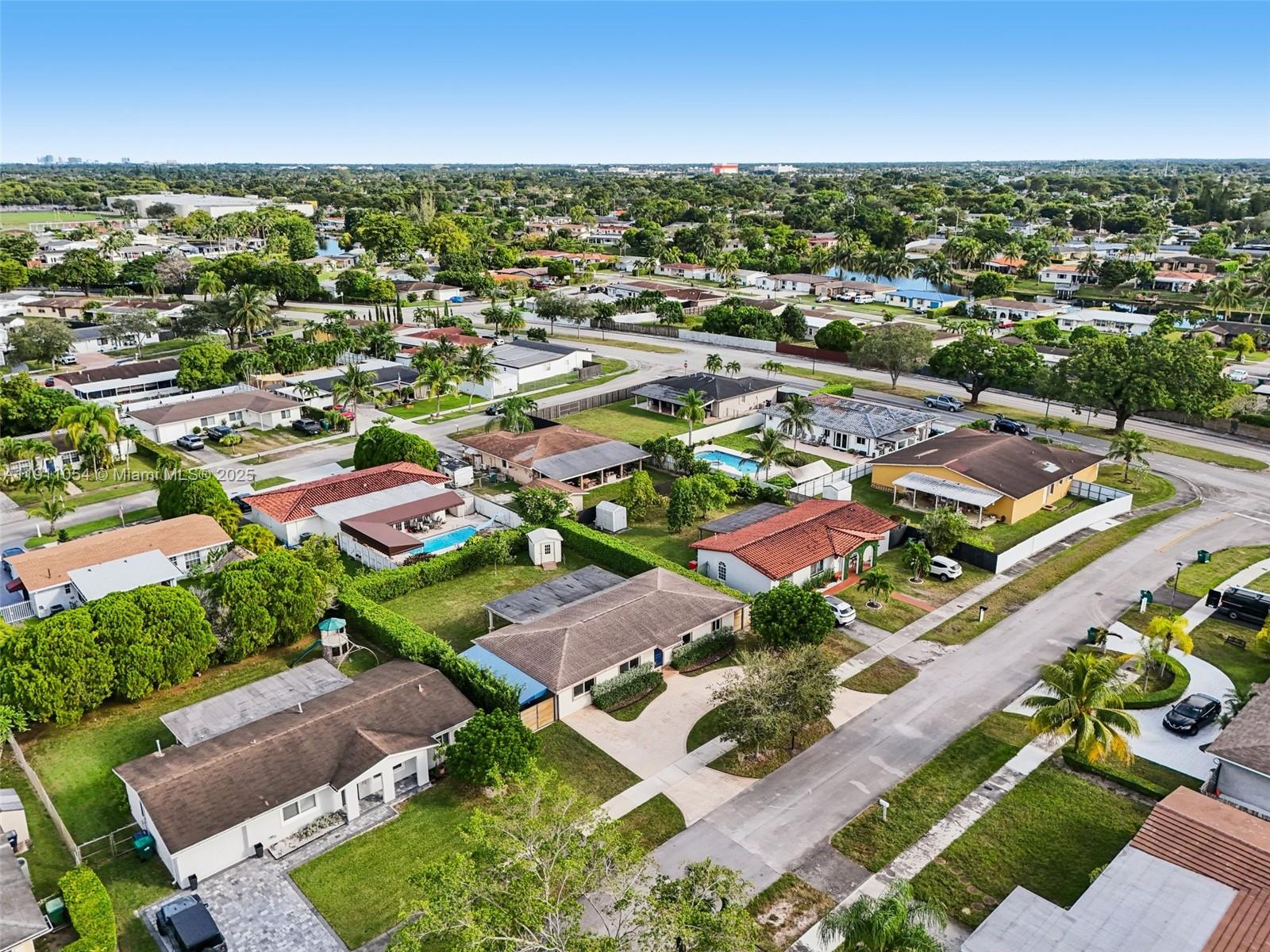6721 Southwest 135th Avenue Miami, FL 33183 - Photo 61 of 66 an aerial view of residential houses with outdoor space