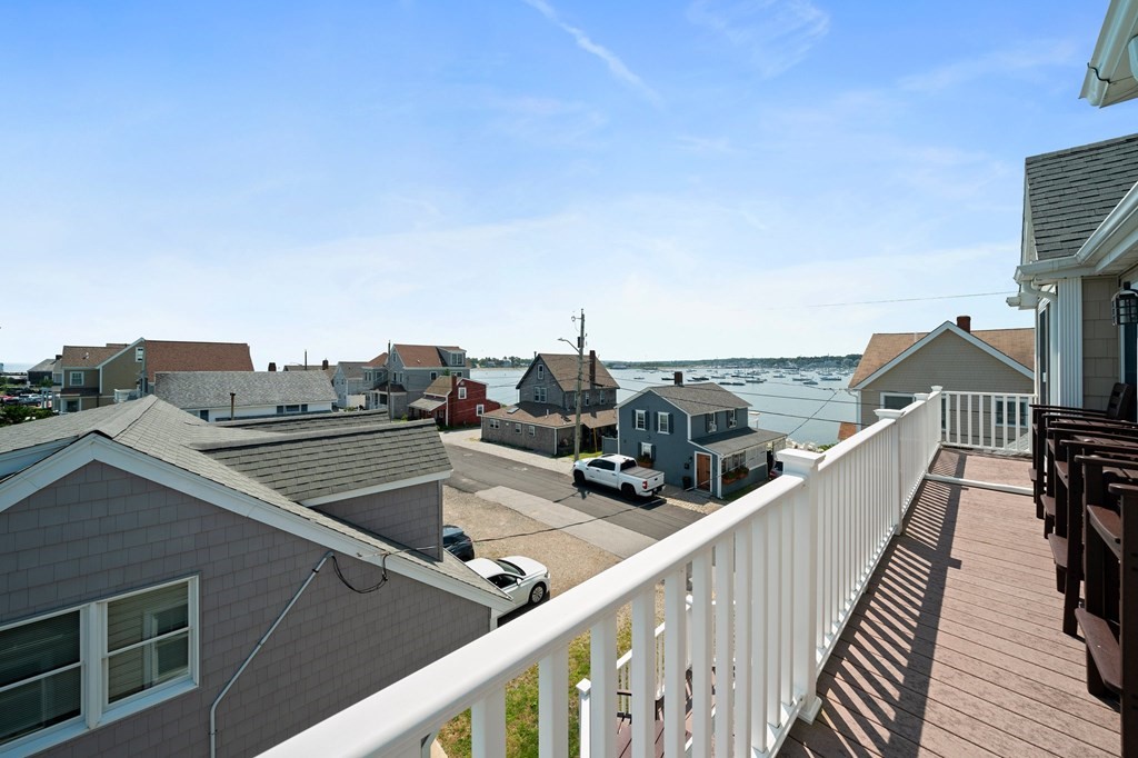 77 Lighthouse Road Scituate, MA 02066 - Photo 37 of 42 a view of a balcony with city view