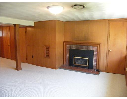 14 McCormick Road Newport, RI 02840 - Photo 4 of 10 Den/Family/Great Room. Spacious Lower Level with Full Bath/Fireplace/Cedar Closet offers Endless Possibilities!