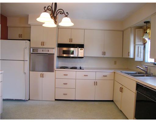 14 McCormick Road Newport, RI 02840 - Photo 5 of 10 Kitchen. Eat-in Kitchen with Ample Cabinets and Access to Large Deck!