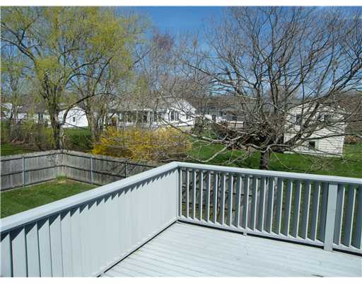 14 McCormick Road Newport, RI 02840 - Photo 6 of 10 Patio/Deck. Large Deck Overlooks Spacious Back Yard with Access to Fenced Area