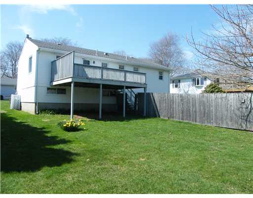 14 McCormick Road Newport, RI 02840 - Photo 7 of 10 Patio/Deck. Back Yard with Deck and Fenced Area