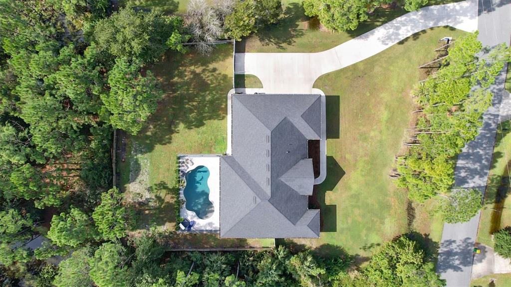 3262 Pheasant Trail Mims, FL 32754 - Photo 12 of 79 an aerial view of a house with swimming pool