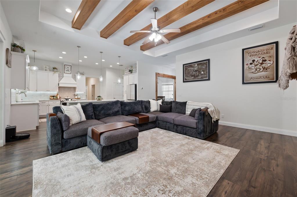 3262 Pheasant Trail Mims, FL 32754 - Photo 33 of 79 a living room with furniture and a view of kitchen
