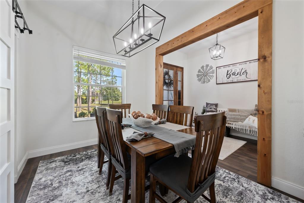 3262 Pheasant Trail Mims, FL 32754 - Photo 36 of 79 a view of a dining room with furniture window and outside view