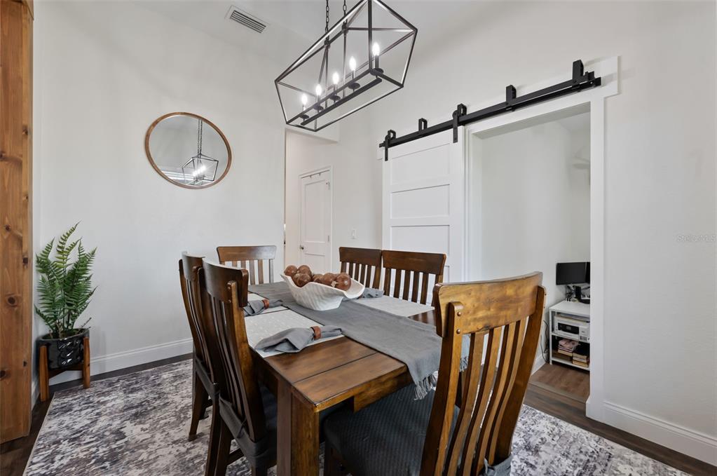 3262 Pheasant Trail Mims, FL 32754 - Photo 37 of 79 a view of a dining room with furniture