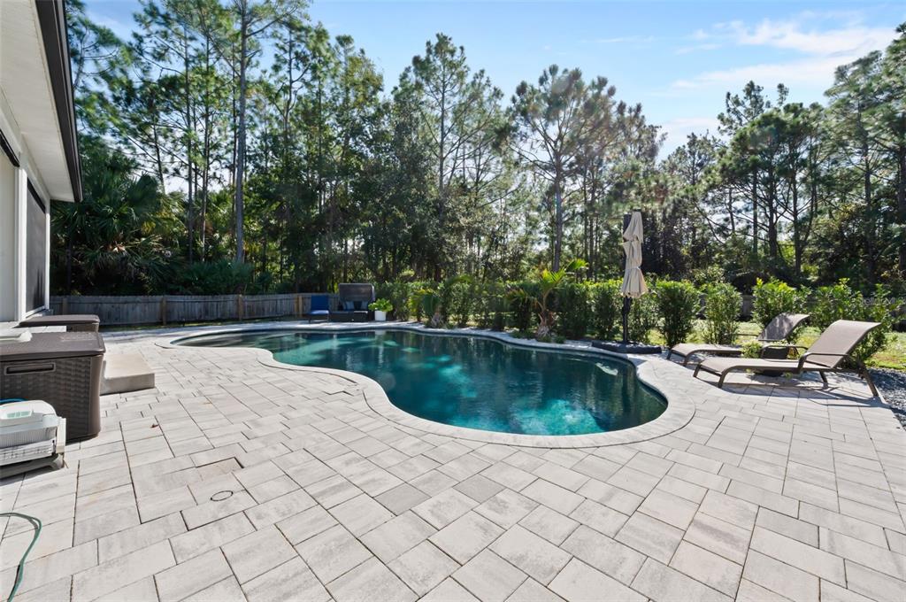 3262 Pheasant Trail Mims, FL 32754 - Photo 48 of 79 a view of swimming pool with seating space