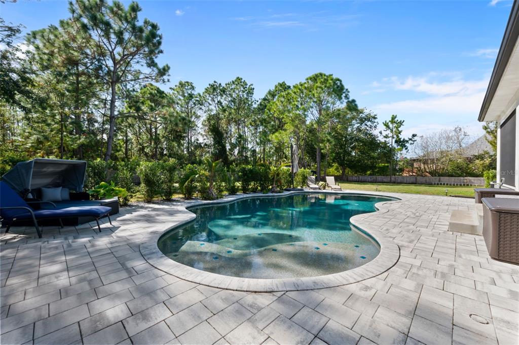 3262 Pheasant Trail Mims, FL 32754 - Photo 49 of 79 a view of a fountain in the backyard of a house