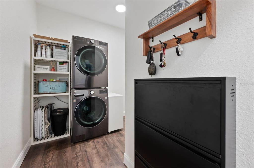 3262 Pheasant Trail Mims, FL 32754 - Photo 56 of 79 a utility room with sink dryer and washer