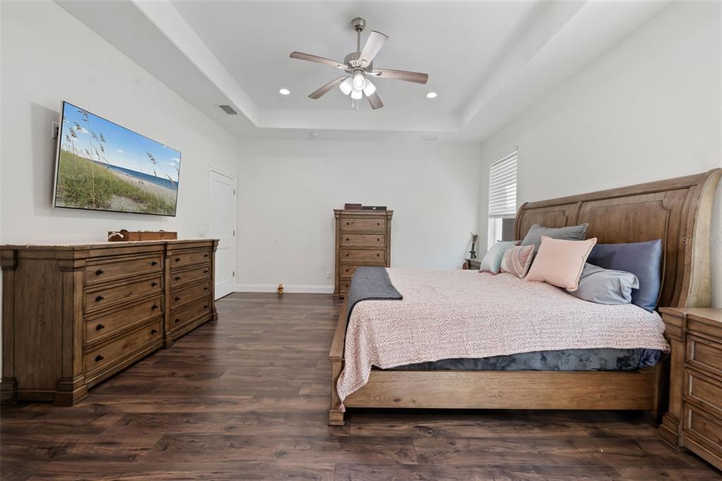 3262 Pheasant Trail Mims, FL 32754 - Photo 57 of 79 a bedroom with a bed and a flat screen tv