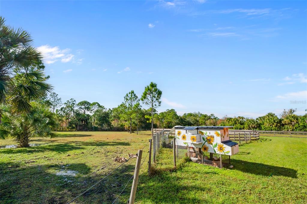 3262 Pheasant Trail Mims, FL 32754 - Photo 63 of 79 a view of a lake with houses in the back