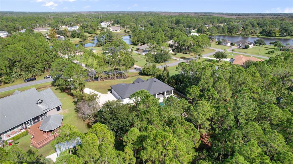 3262 Pheasant Trail Mims, FL 32754 - Photo 7 of 79 an aerial view of residential houses with outdoor space and trees