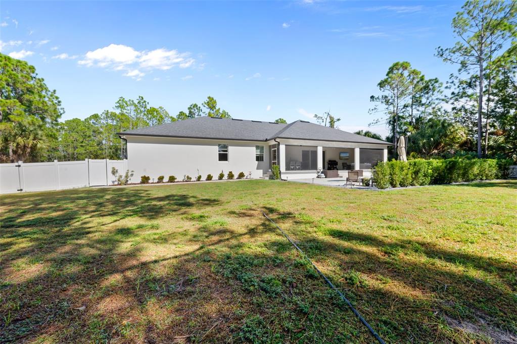 3262 Pheasant Trail Mims, FL 32754 - Photo 71 of 79 a front view of a house with a yard