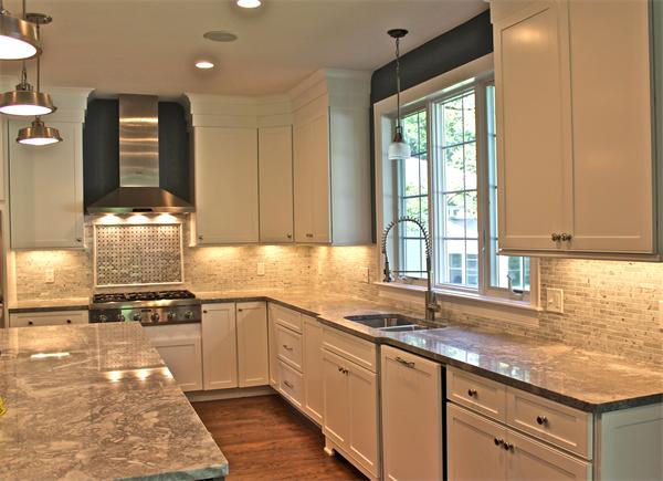 136 Tudor Road Needham, MA 02492 - Photo 6 of 18 a kitchen with a sink window and cabinets