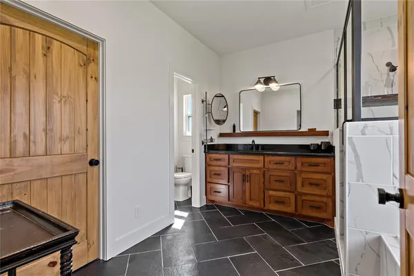 a view of a kitchen with a sink