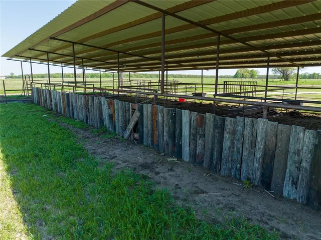 a view of a golf course with chairs