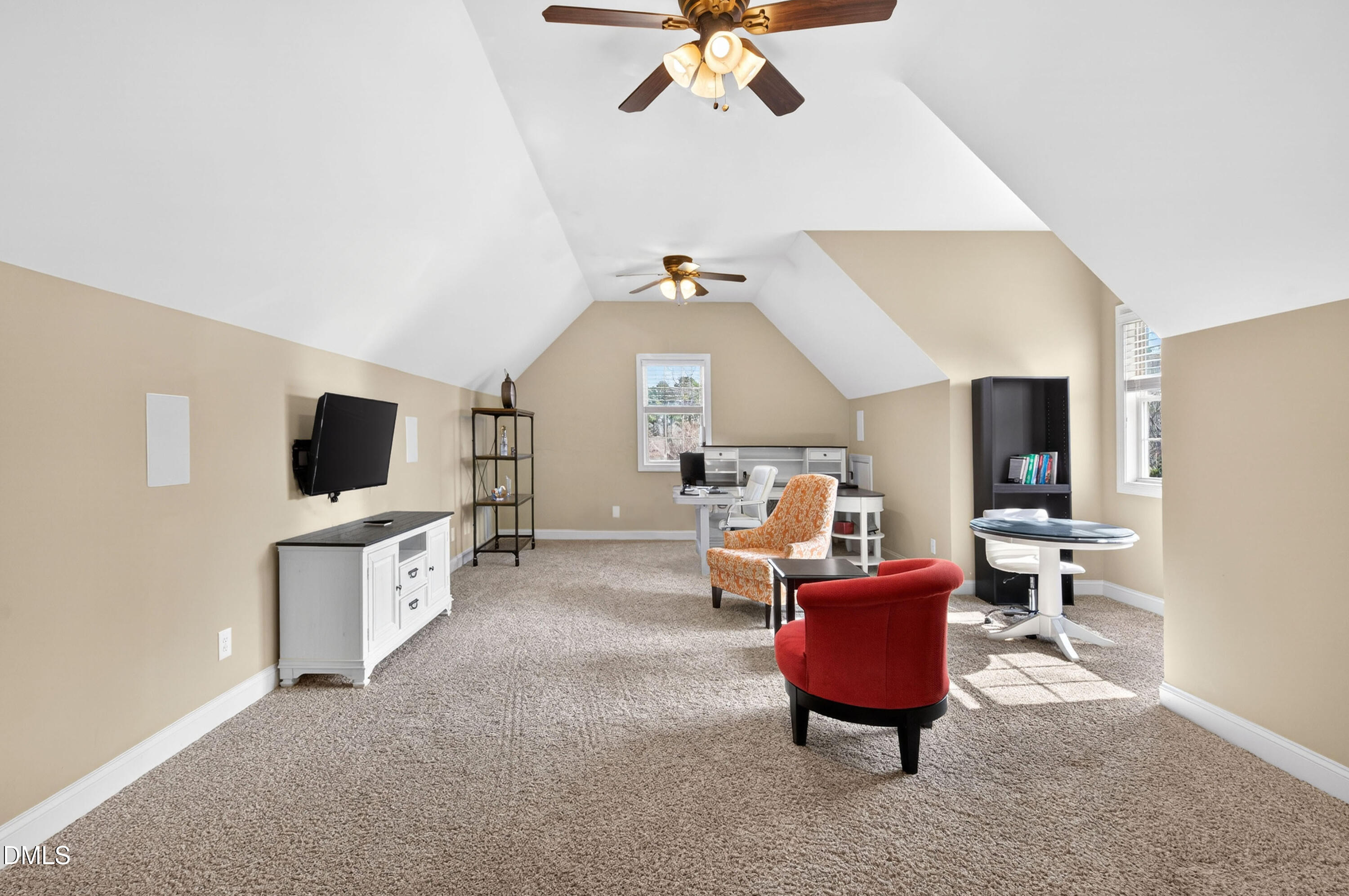 691 Hawthorne Place Creedmoor, NC 27522 - Photo 65 of 84 a living room with furniture and a flat screen tv