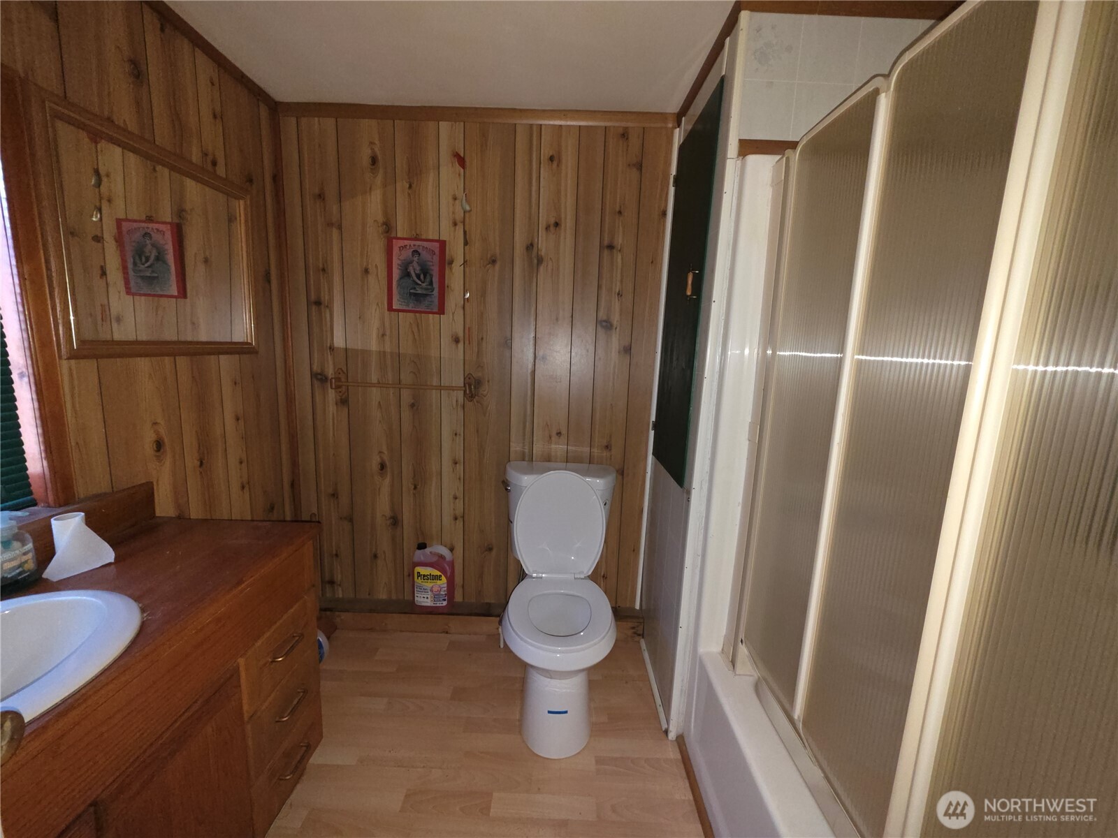 105 Emily Road Oroville, WA 98844 - Photo 11 of 24 a bathroom with a toilet and a mirror