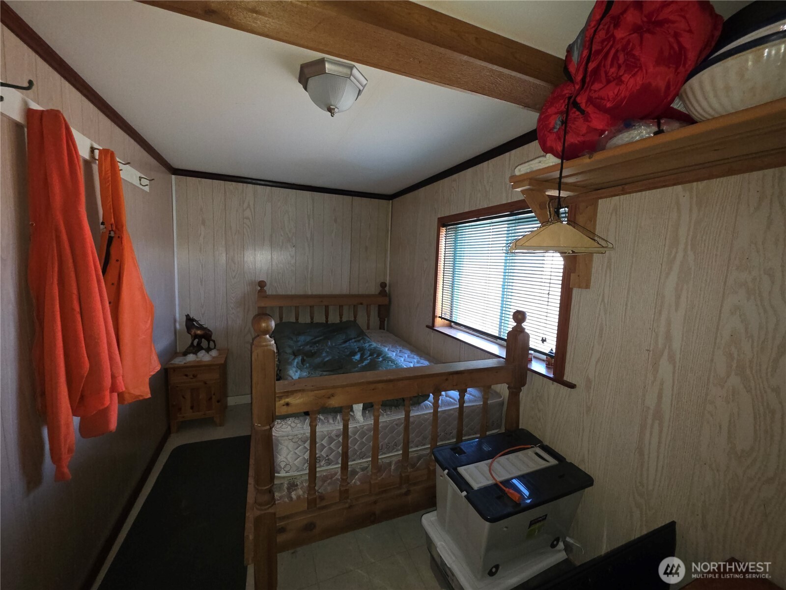 105 Emily Road Oroville, WA 98844 - Photo 12 of 24 a room with furniture and a window