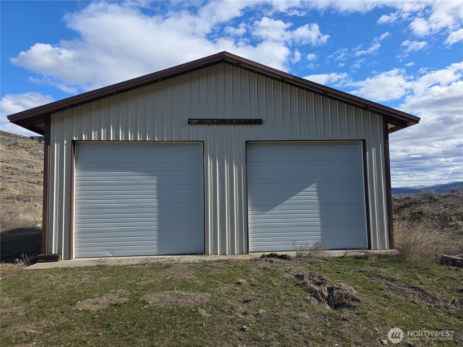 105 Emily Road Oroville, WA 98844 - Photo 2 of 24 a front view of a house