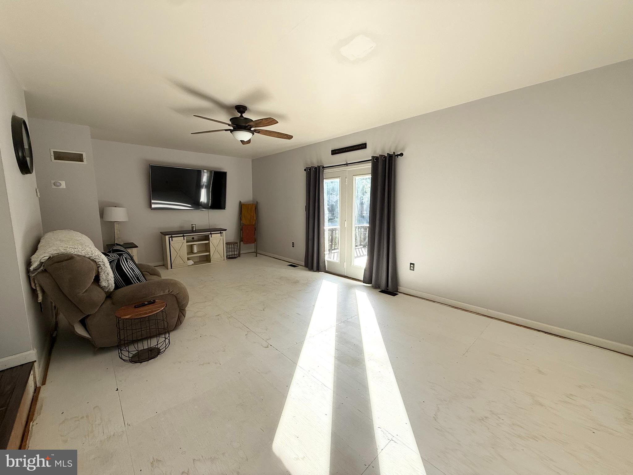 60-6 Mint Tier Reading, PA 19606 - Photo 17 of 50 a living room with furniture and a flat screen tv
