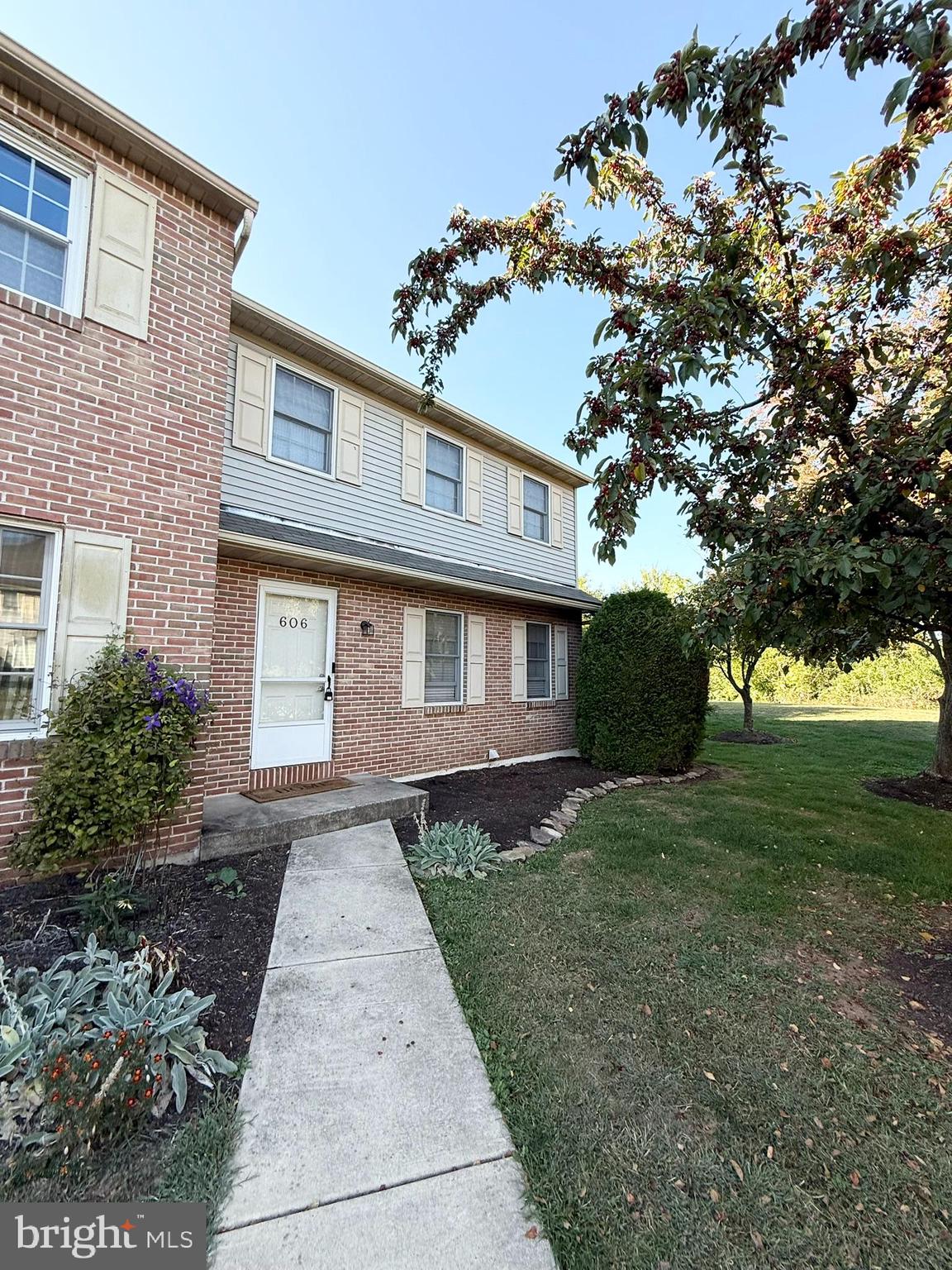 60-6 Mint Tier Reading, PA 19606 - Photo 2 of 50 a front view of a house with garden
