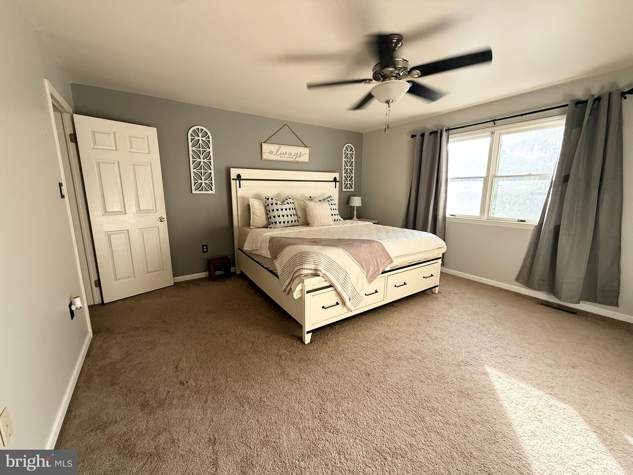 60-6 Mint Tier Reading, PA 19606 - Photo 21 of 50 a bed sitting in a spacious bedroom next to a window