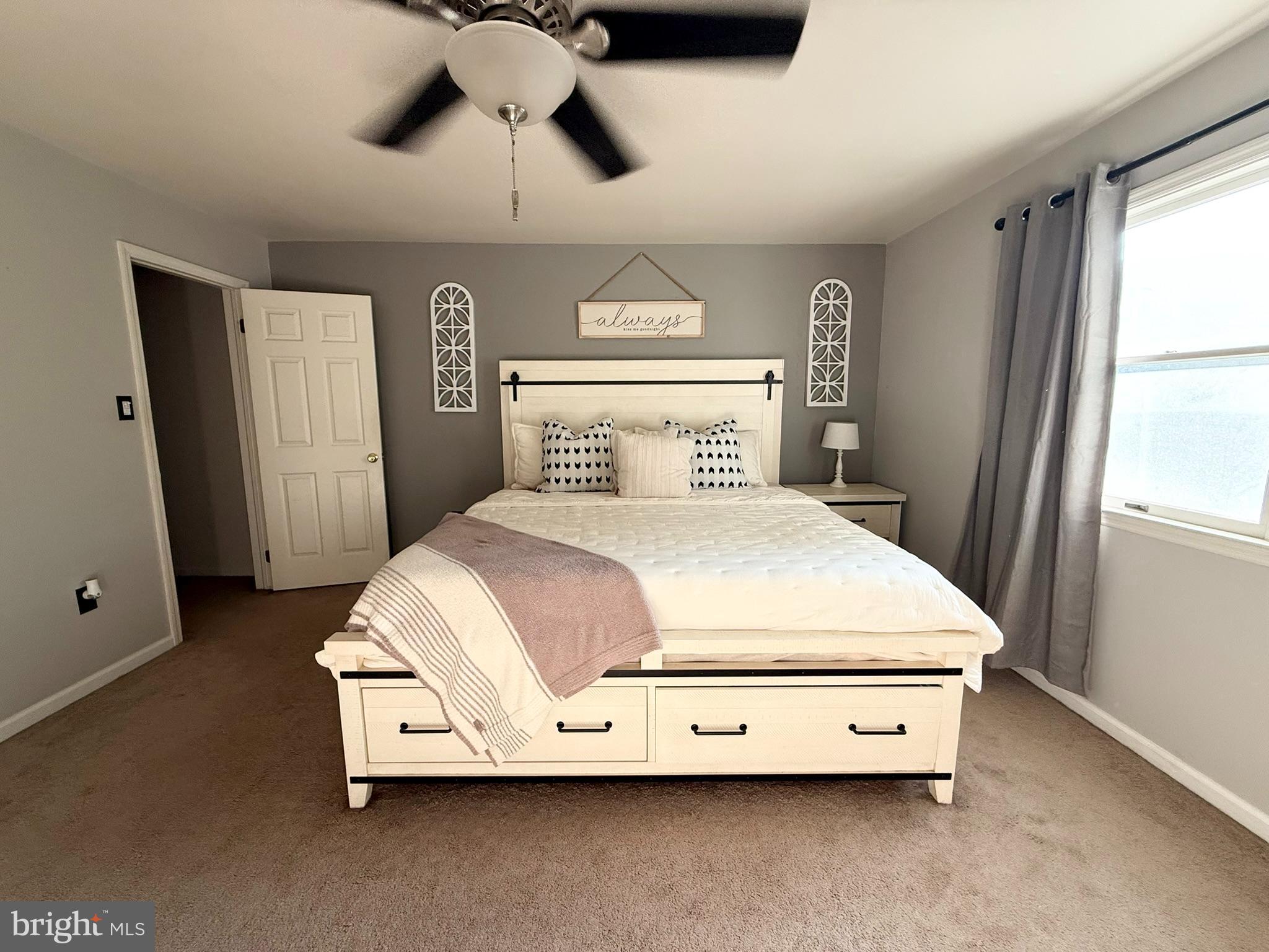 60-6 Mint Tier Reading, PA 19606 - Photo 22 of 50 a large bed sitting in a room next to a window