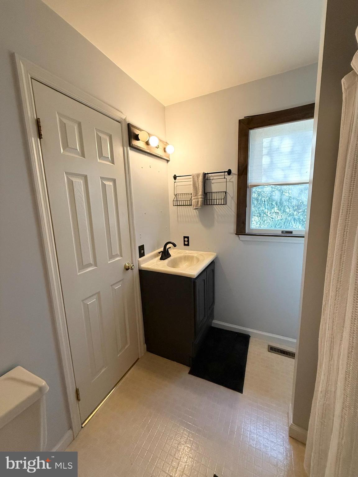 60-6 Mint Tier Reading, PA 19606 - Photo 25 of 50 a room with a sink and a mirror