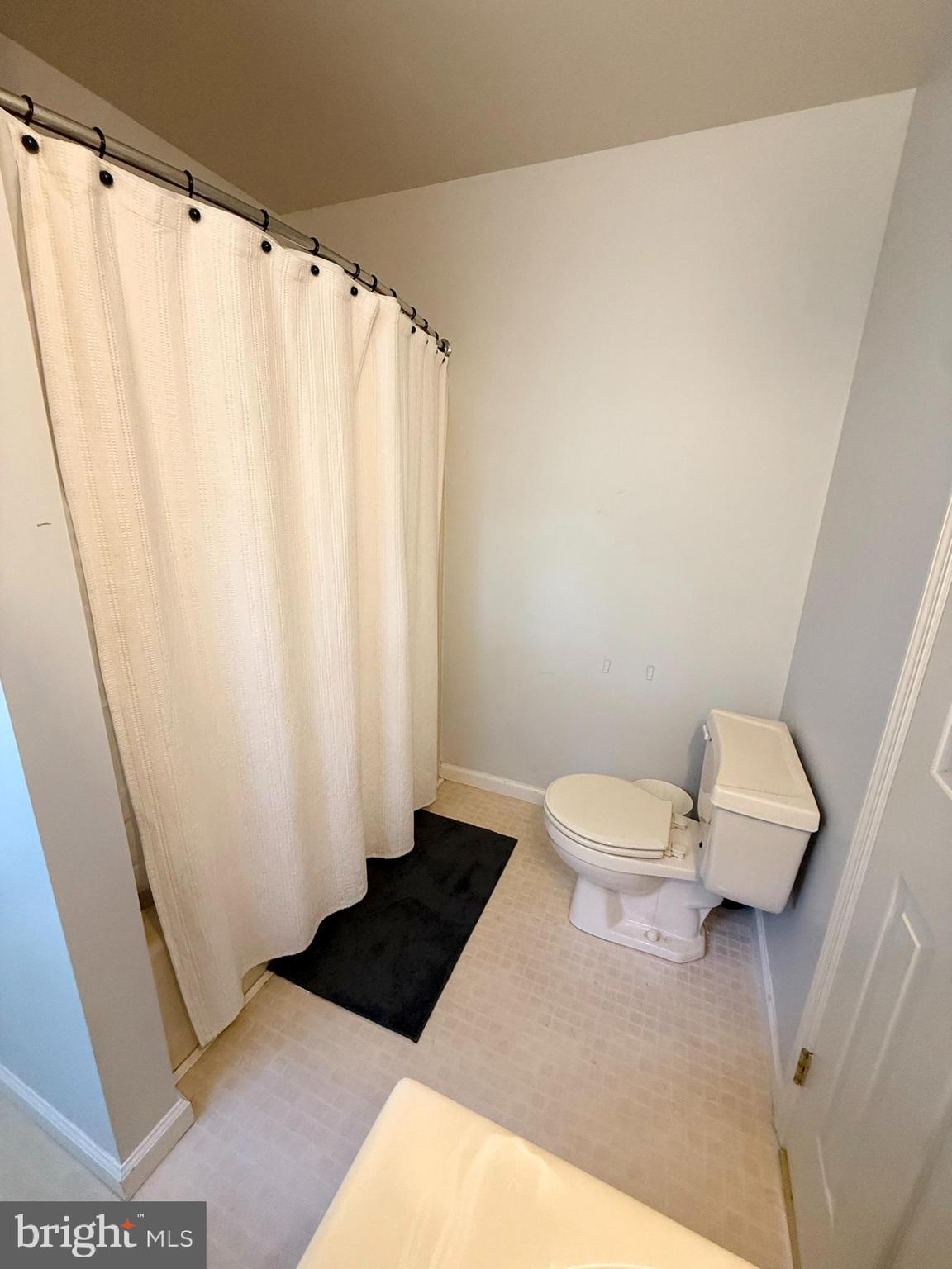 60-6 Mint Tier Reading, PA 19606 - Photo 26 of 50 a bathroom with a sink a toilet a window and a shower