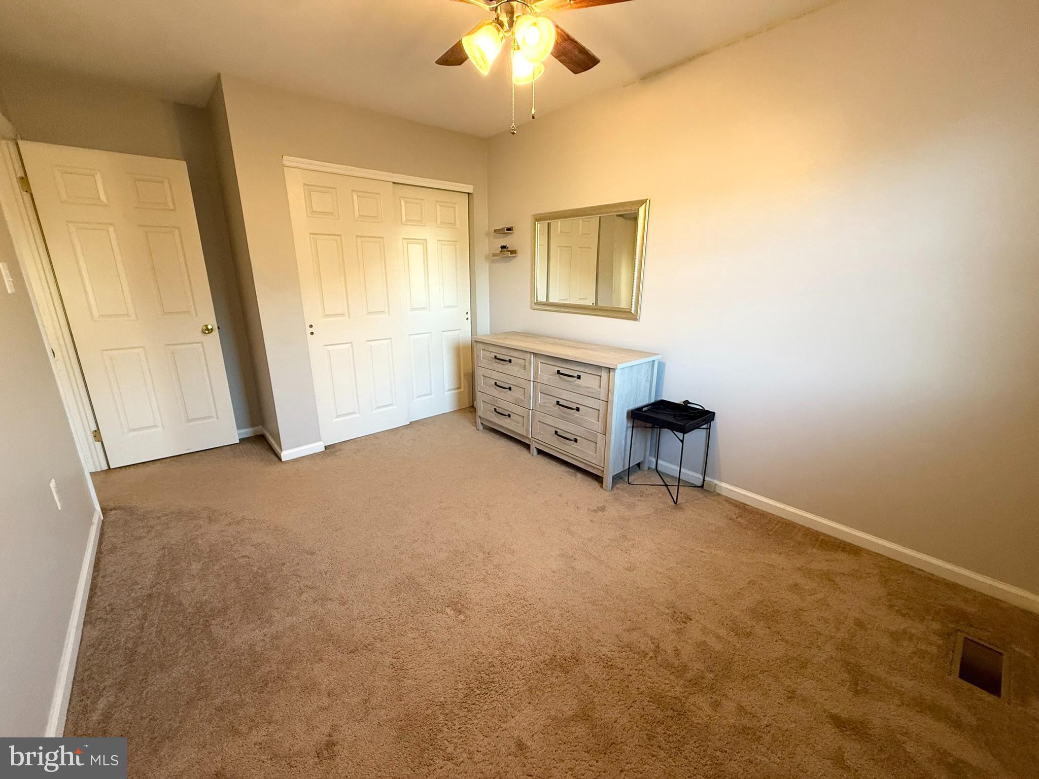 60-6 Mint Tier Reading, PA 19606 - Photo 32 of 50 a view of a livingroom with furniture and a ceiling fan