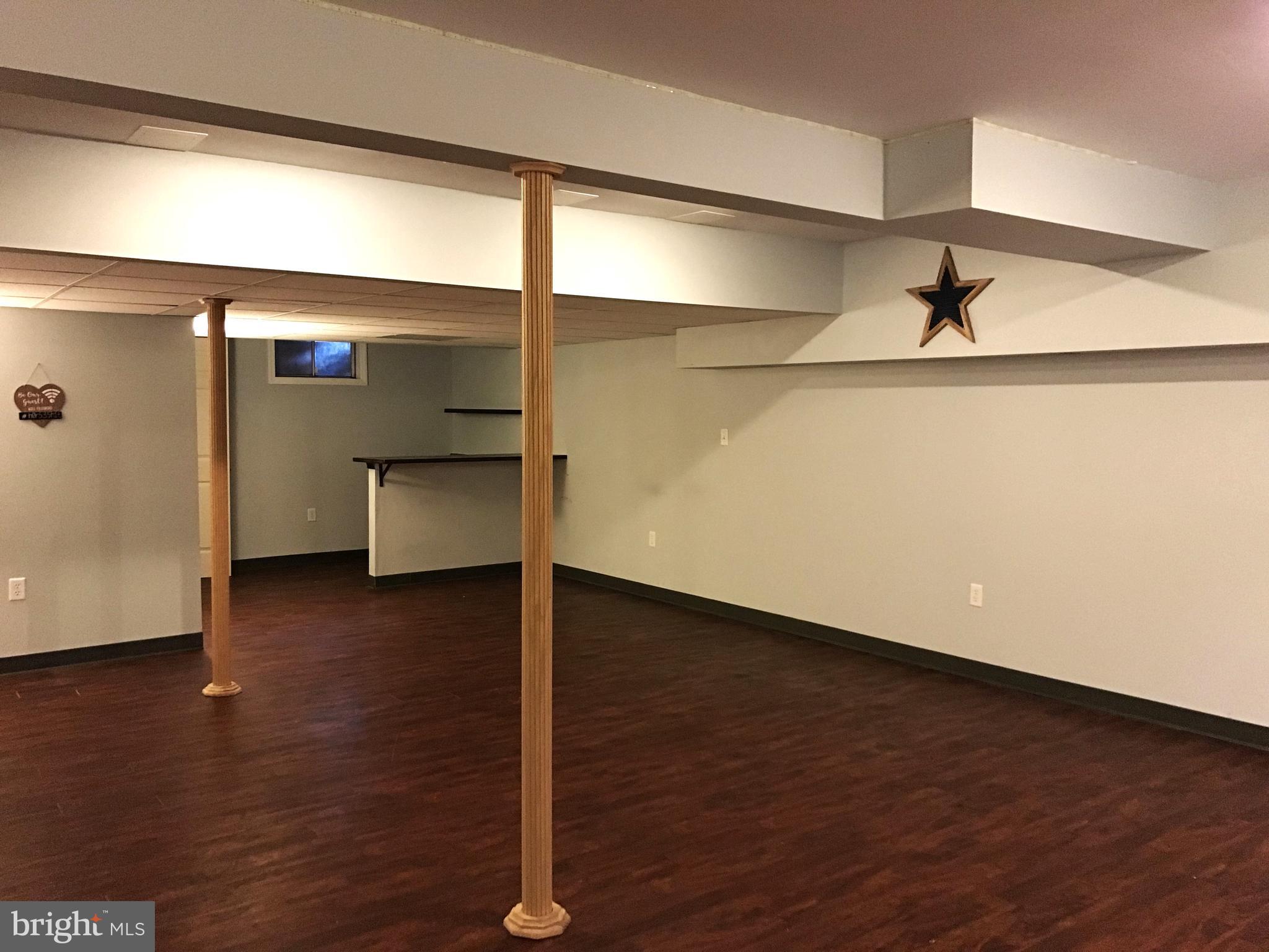 60-6 Mint Tier Reading, PA 19606 - Photo 37 of 50 a view of empty room with wooden floor and fan