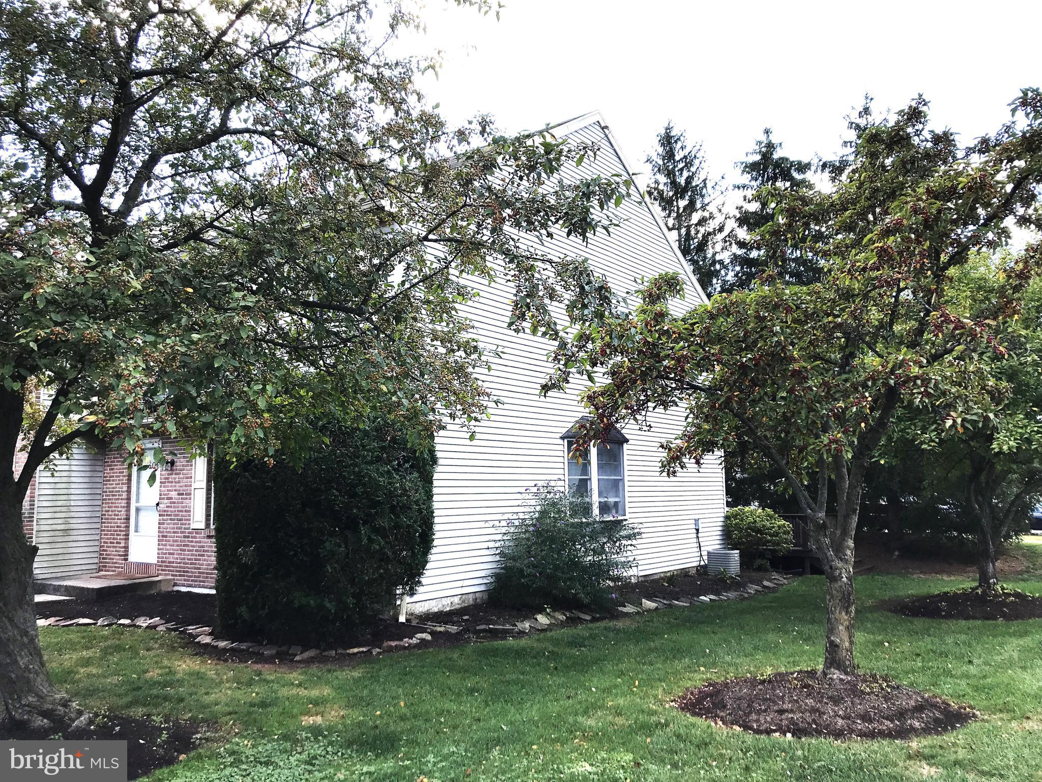 60-6 Mint Tier Reading, PA 19606 - Photo 45 of 50 a front view of a house with a garden