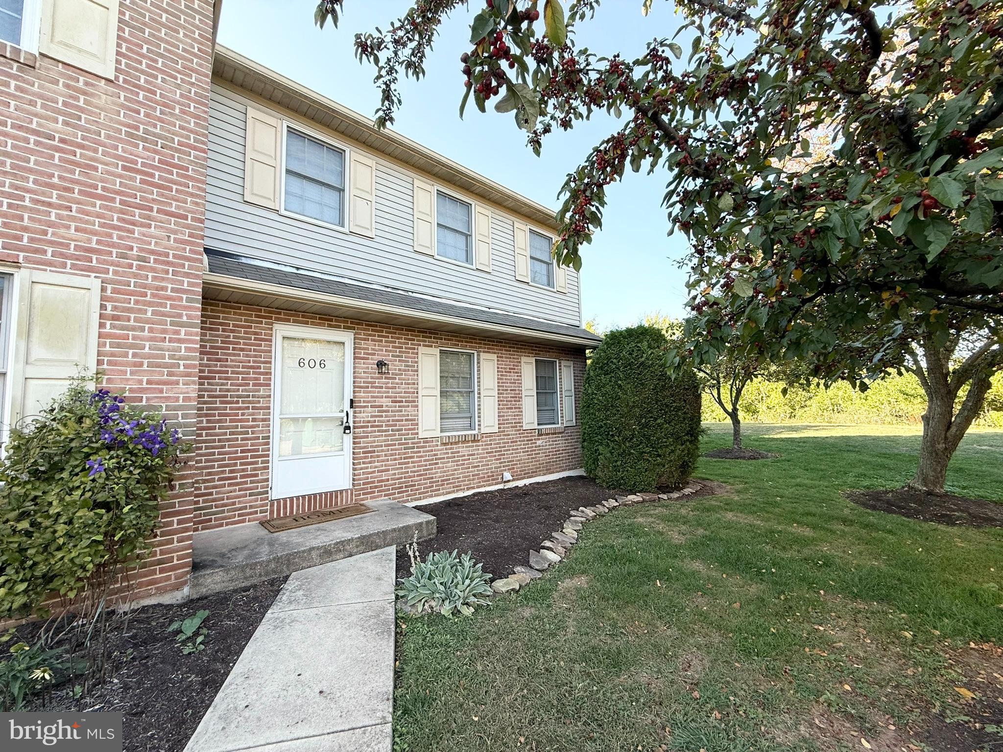 60-6 Mint Tier Reading, PA 19606 - Photo 50 of 50 a front view of a house with garden