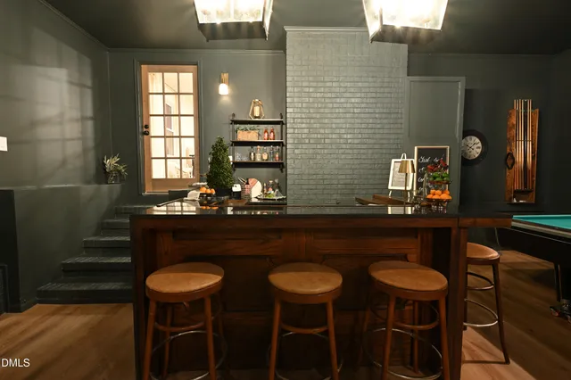 a view of barbeque area with seating area