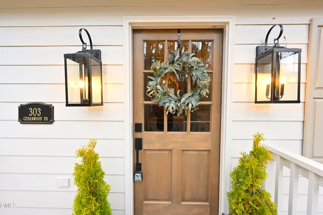 a bathroom with a window and a shower