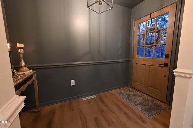 a kitchen with stainless steel appliances a sink stove and cabinets