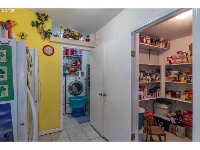 a view of a closet with storage