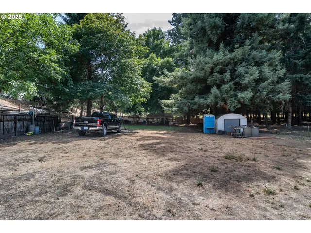 a view of outdoor space with truck parked
