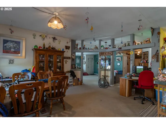 a view of a dining room with furniture window and outside view