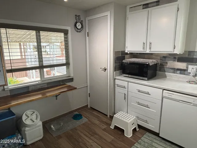 a bathroom with a sink and a window