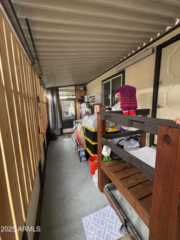 a room with lots of furniture and windows