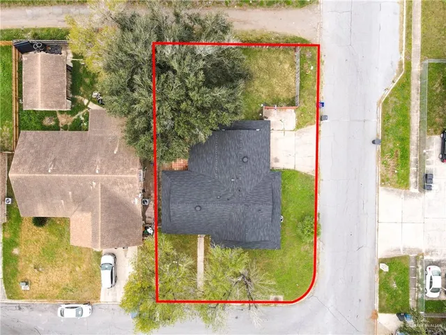 swimming pool view with a garden and plants