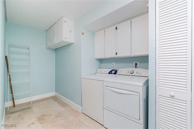 a view of a lake and houses in the background