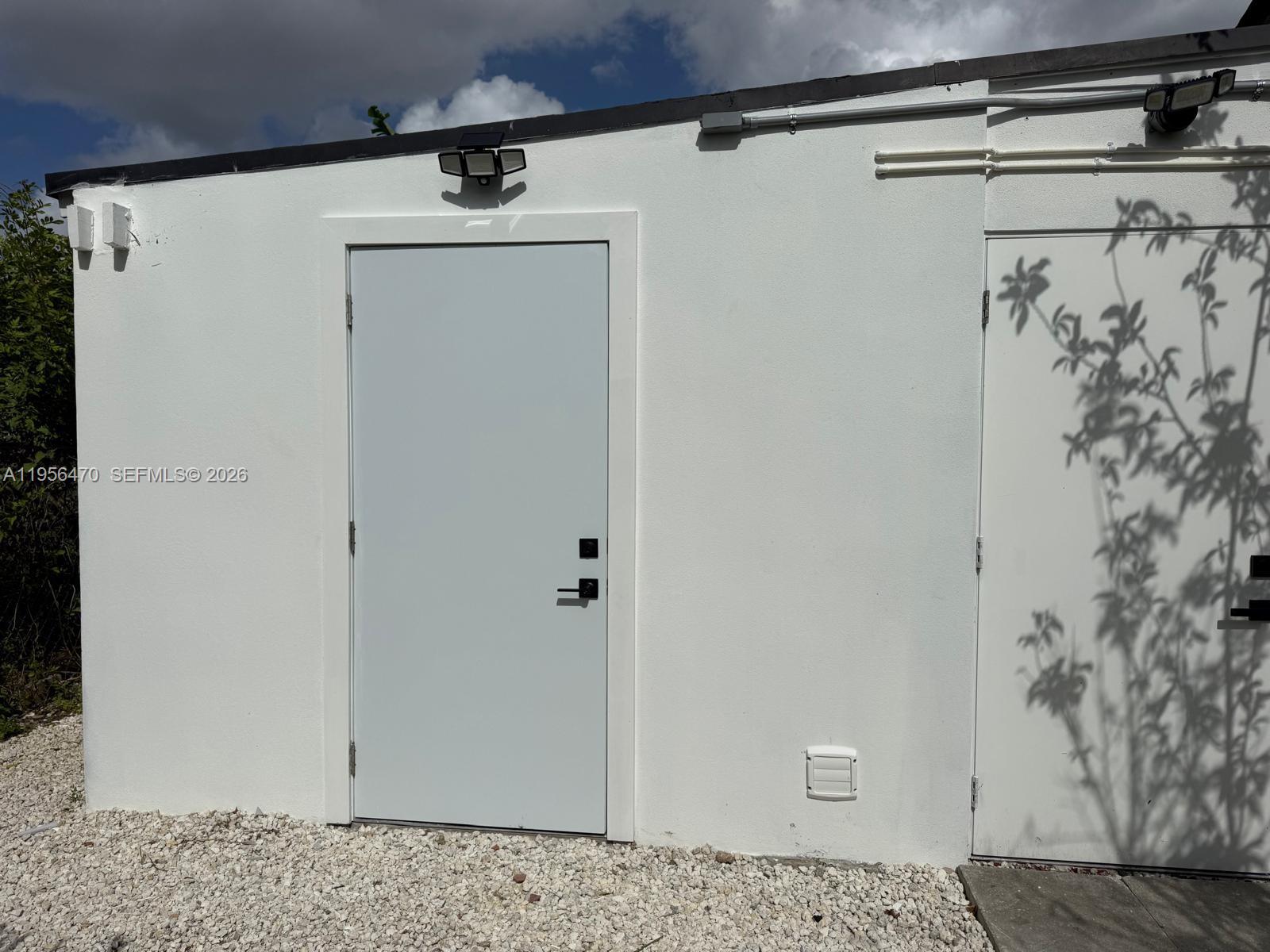 18481 Southwest 208th Street, Unit 18481 Miami, FL 33187 - Photo 7 of 12 a view of a hallway