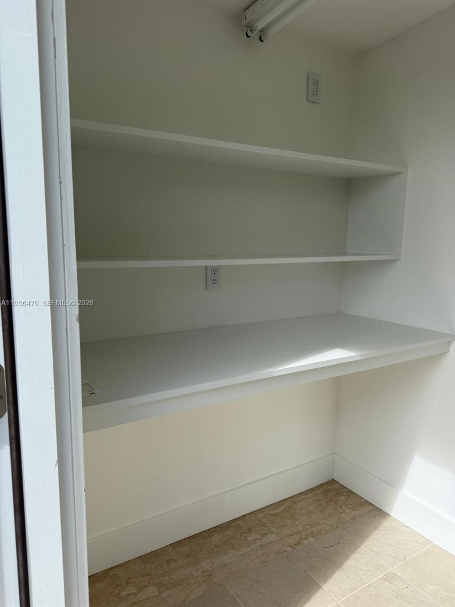 18481 Southwest 208th Street, Unit 18481 Miami, FL 33187 - Photo 10 of 12 a view of a closet