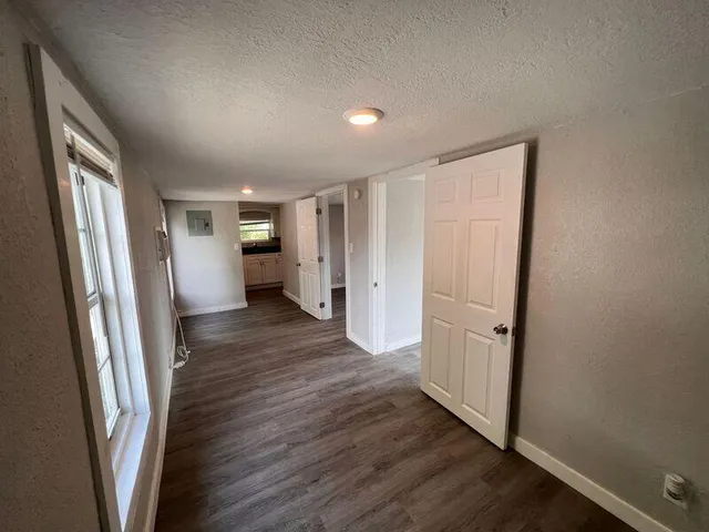 a view of entryway with wooden floor