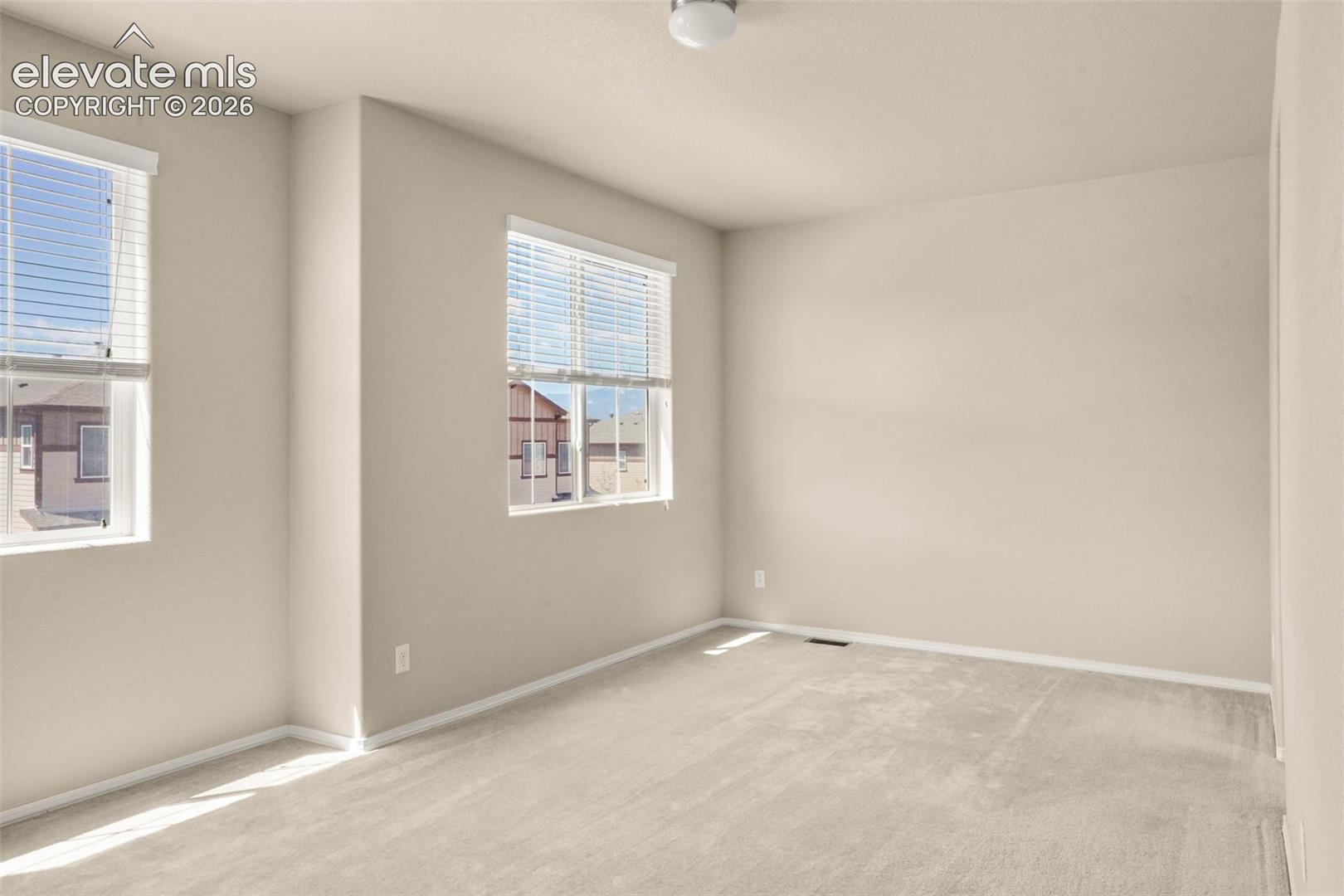 5318 Prominence Point Colorado Springs, CO 80923 - Photo 6 of 29 Primary bedroom suite